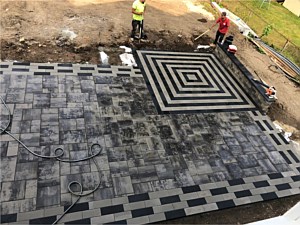 modern gray brick paver patio nicolock granite city alpine smooth pewter raven plank pavers herringbone border design seat wall contemporary corner